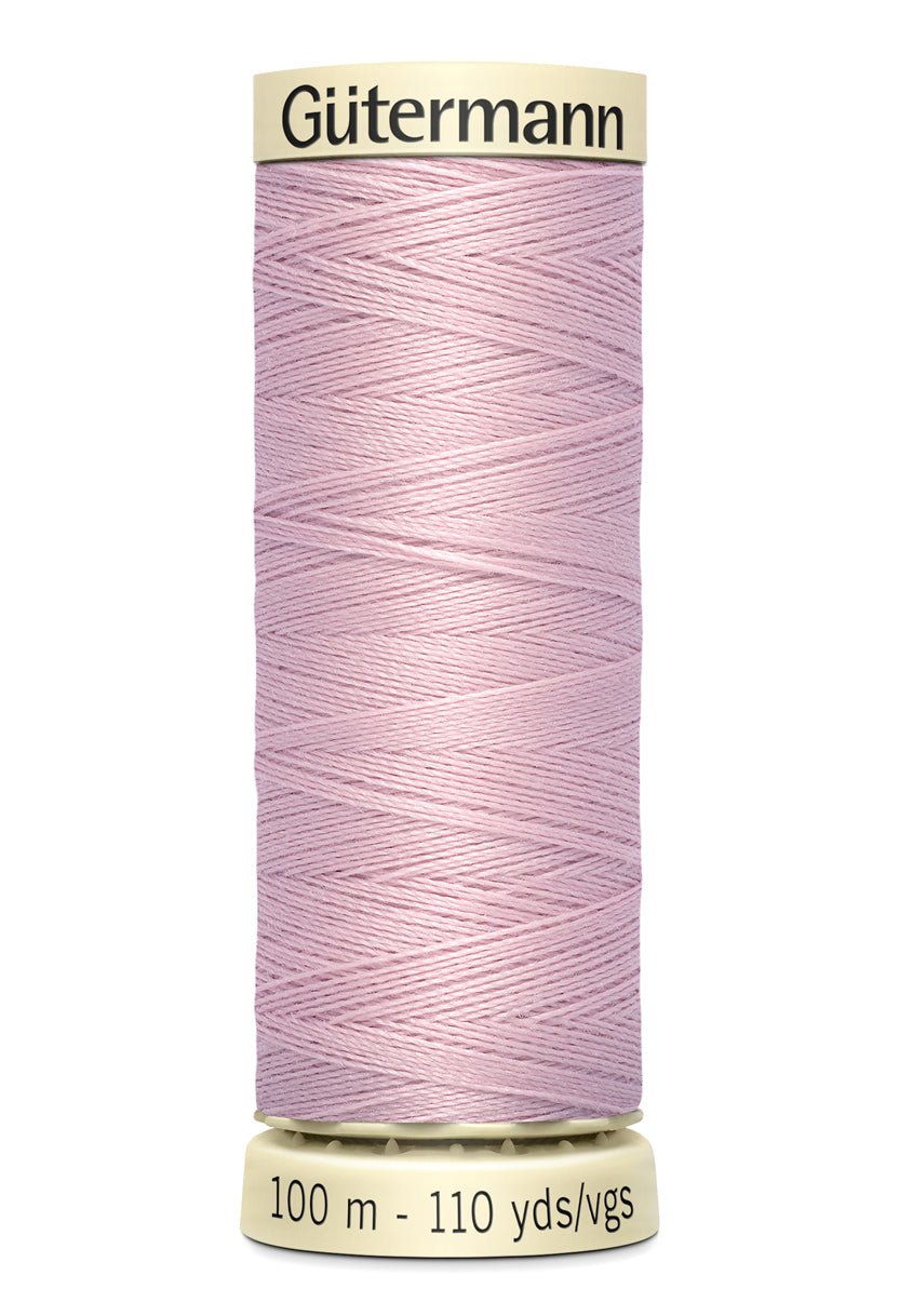 Gütermann Sew-All thread, 100% polyester, 100m spool, light pink.