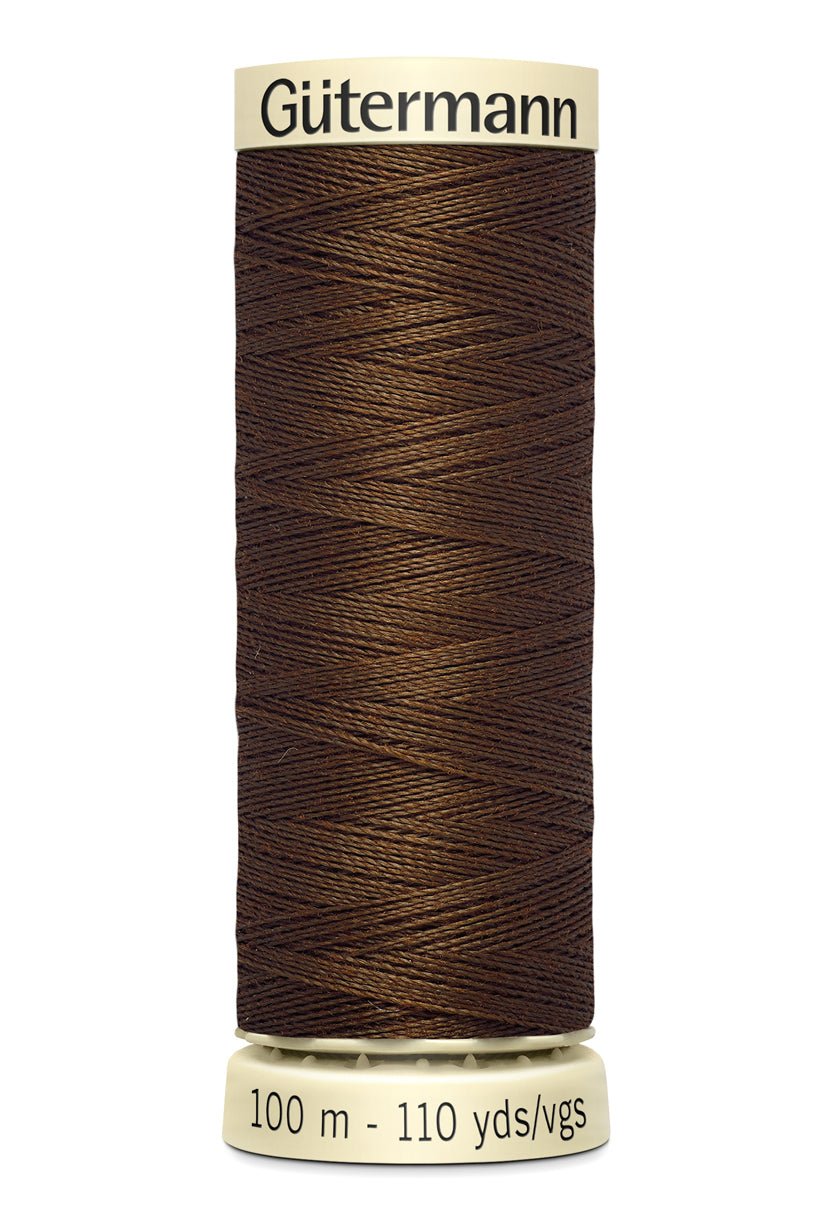 Gutermann Sew-All thread, 100m spool of brown 100% polyester sewing thread.