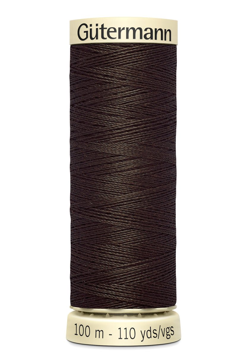 Gutermann Sew-All thread, 100m spool of dark brown 100% polyester thread.