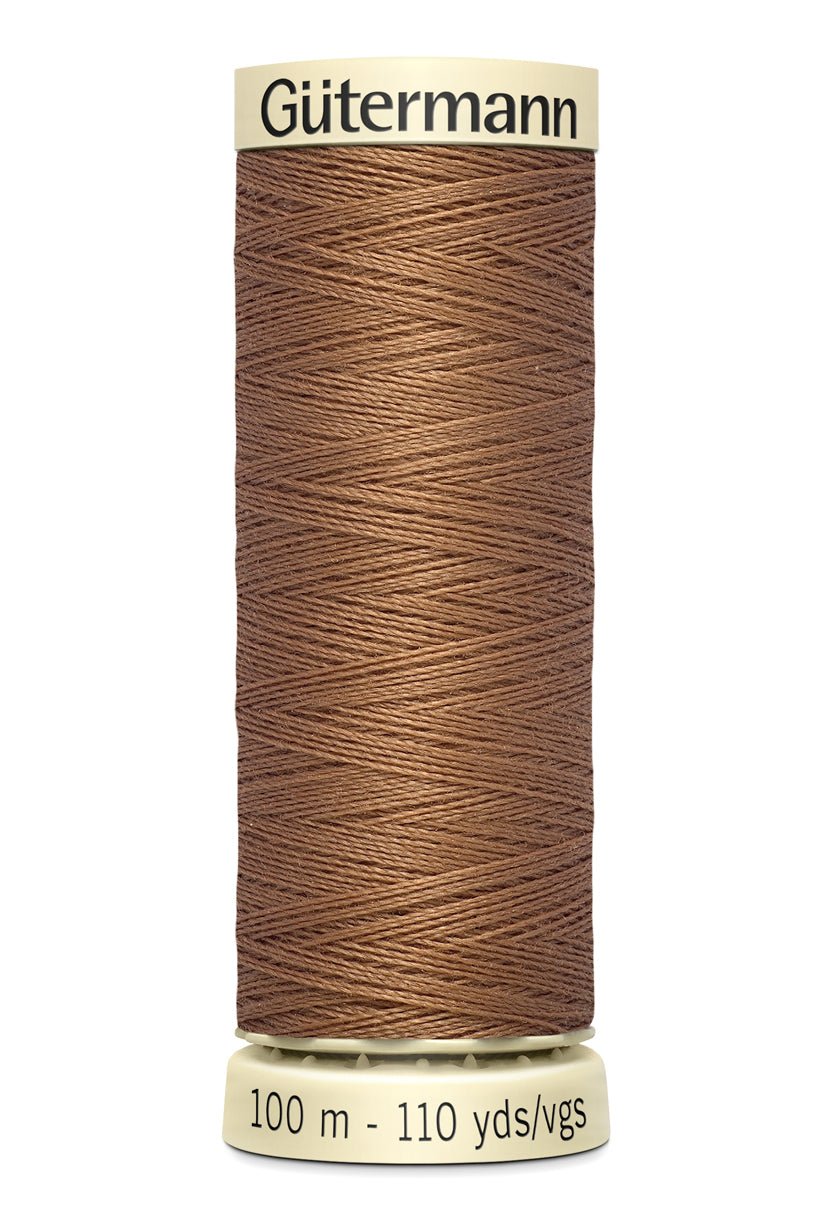 Gutermann Sew-All thread, 100m spool of brown 100% polyester sewing thread.