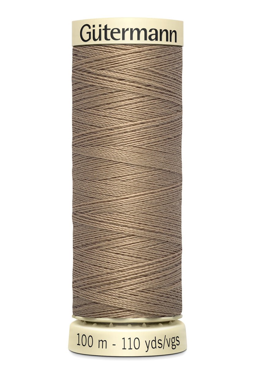 Gutermann Sew-All thread, 100m spool of 100% polyester thread in a light brown color.