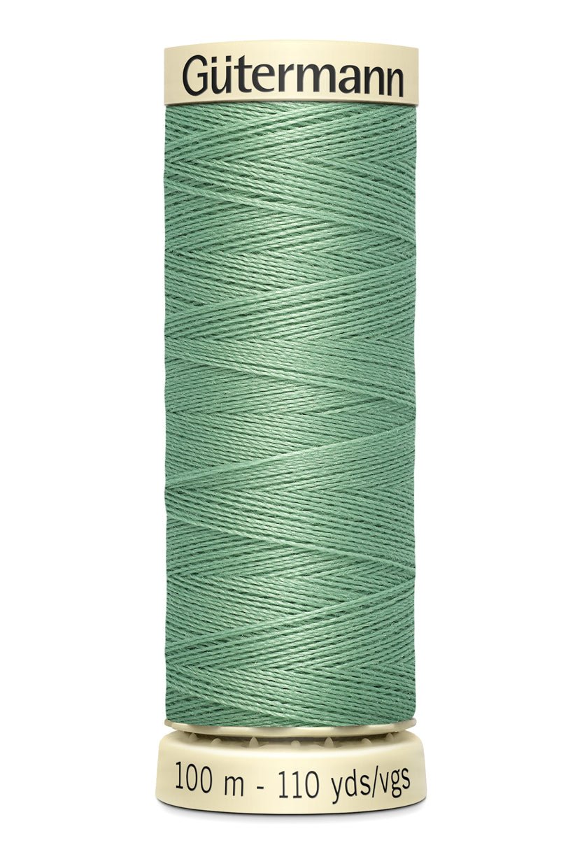 Gutermann Sew-All thread in a light green color, 100m spool.