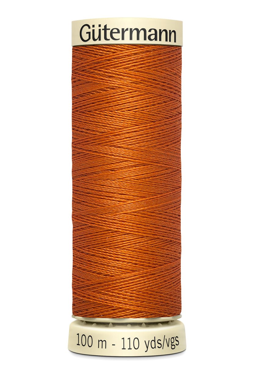 Gutermann Sew-All thread in orange, 100m spool.