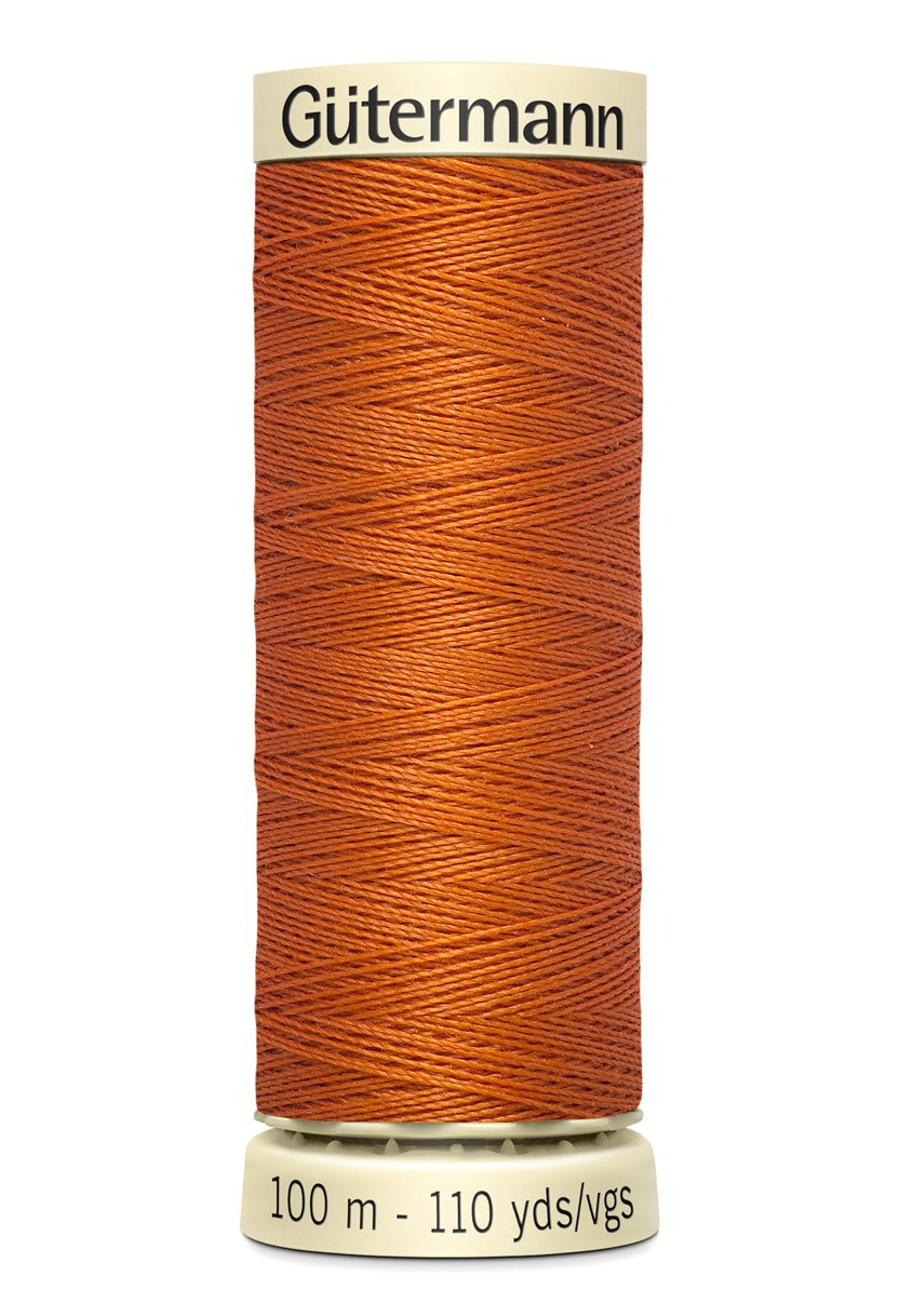 Gutermann Sew-All thread in orange, 100m spool.