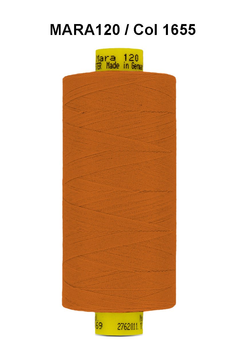 Orange Gutermann Mara 120 thread on a spool.