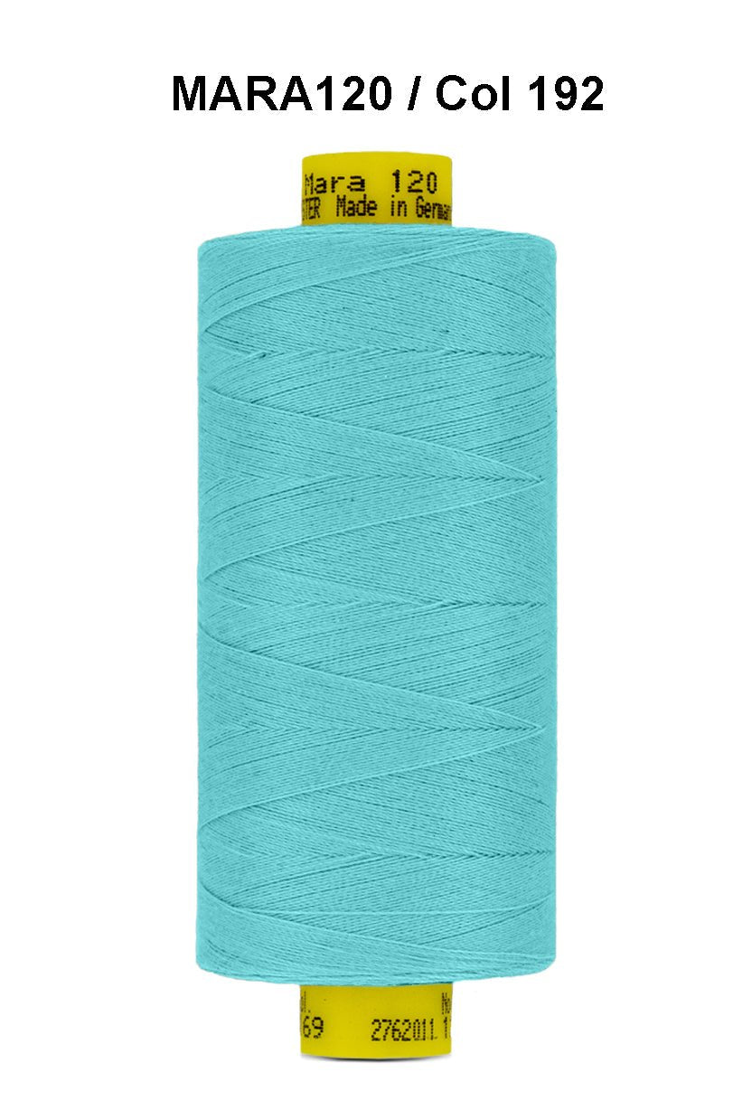 Turquoise Gutermann Mara 120 polyester sewing thread on a spool.