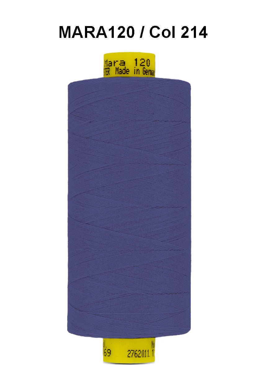 A spool of purple Gutermann Mara 120 thread with product information on the label.
