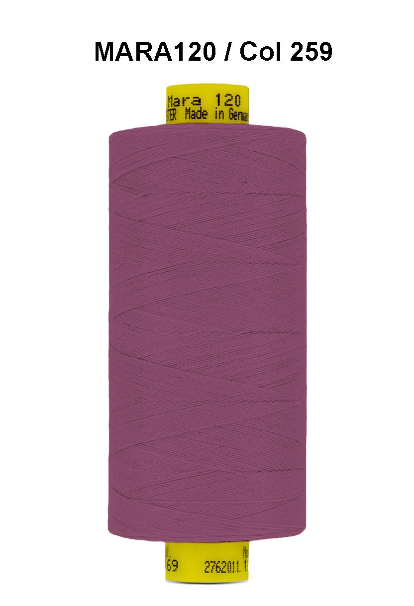 A spool of purple Gutermann Mara 120 thread with color code 259.