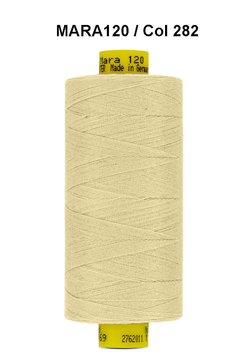 A spool of light yellow Gutermann Mara 120 thread.