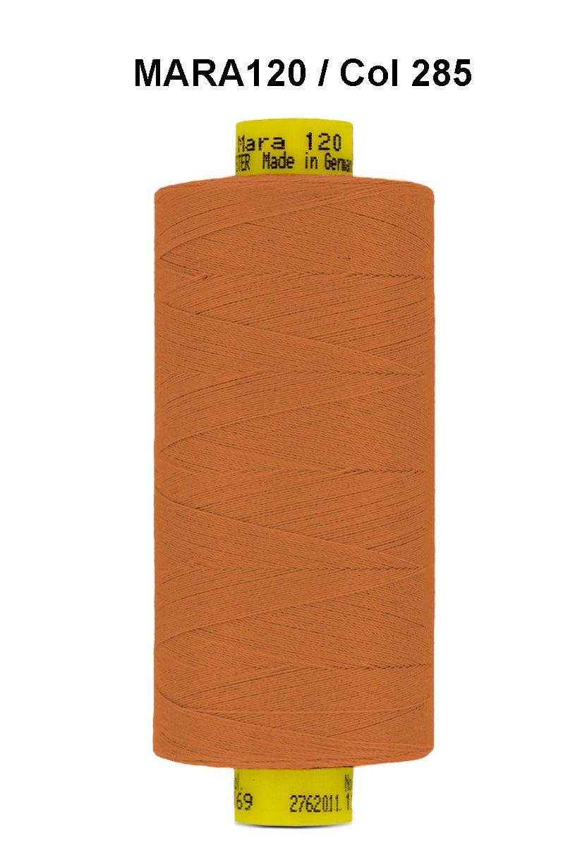 Gutermann Mara 120 thread in orange on a spool.