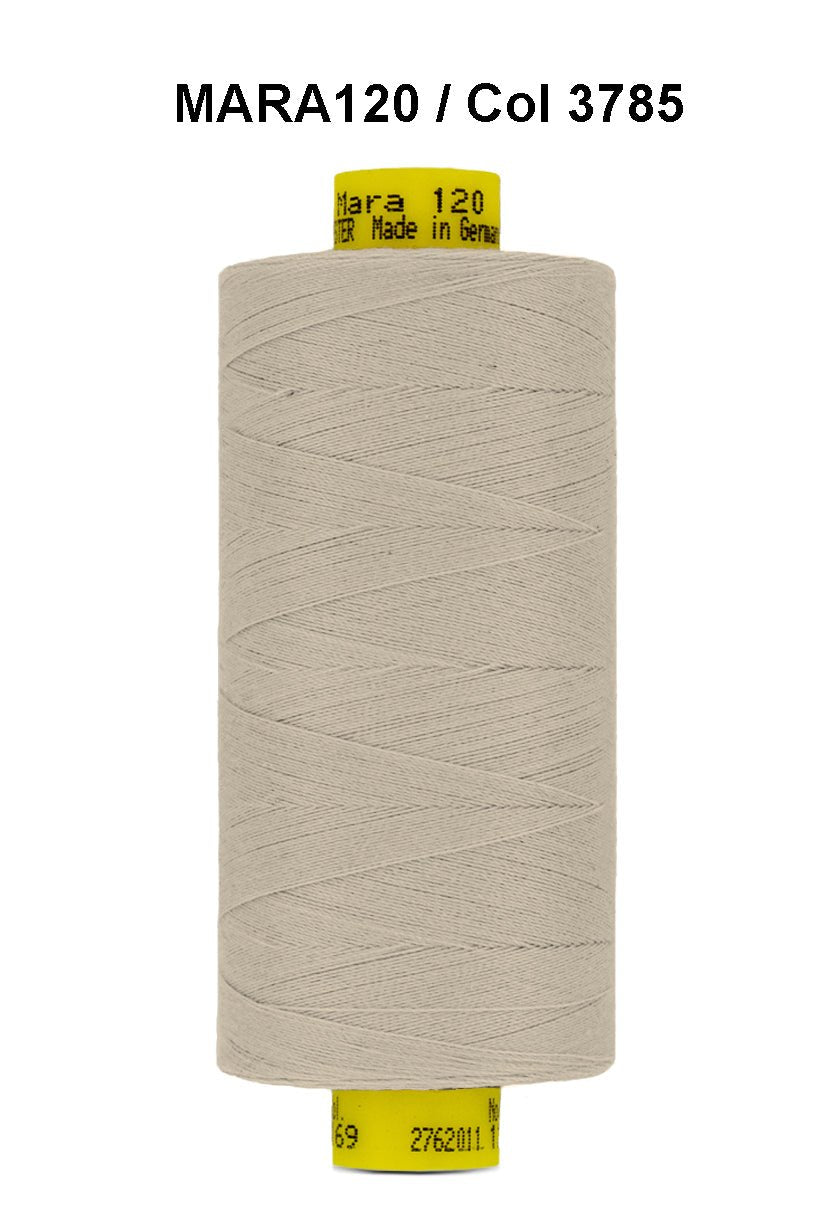 Gutermann Mara 120 thread in a light beige color on a spool.