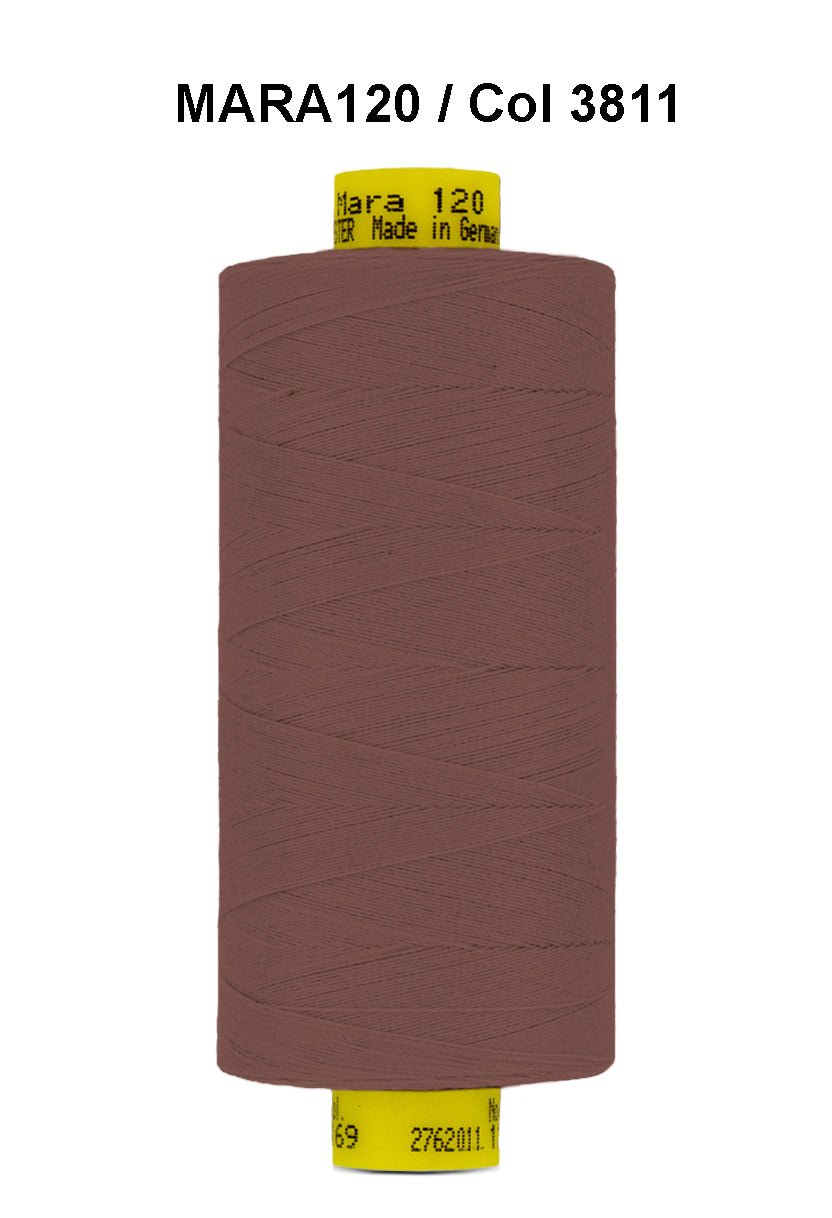 A spool of brown Gutermann Mara 120 polyester thread.
