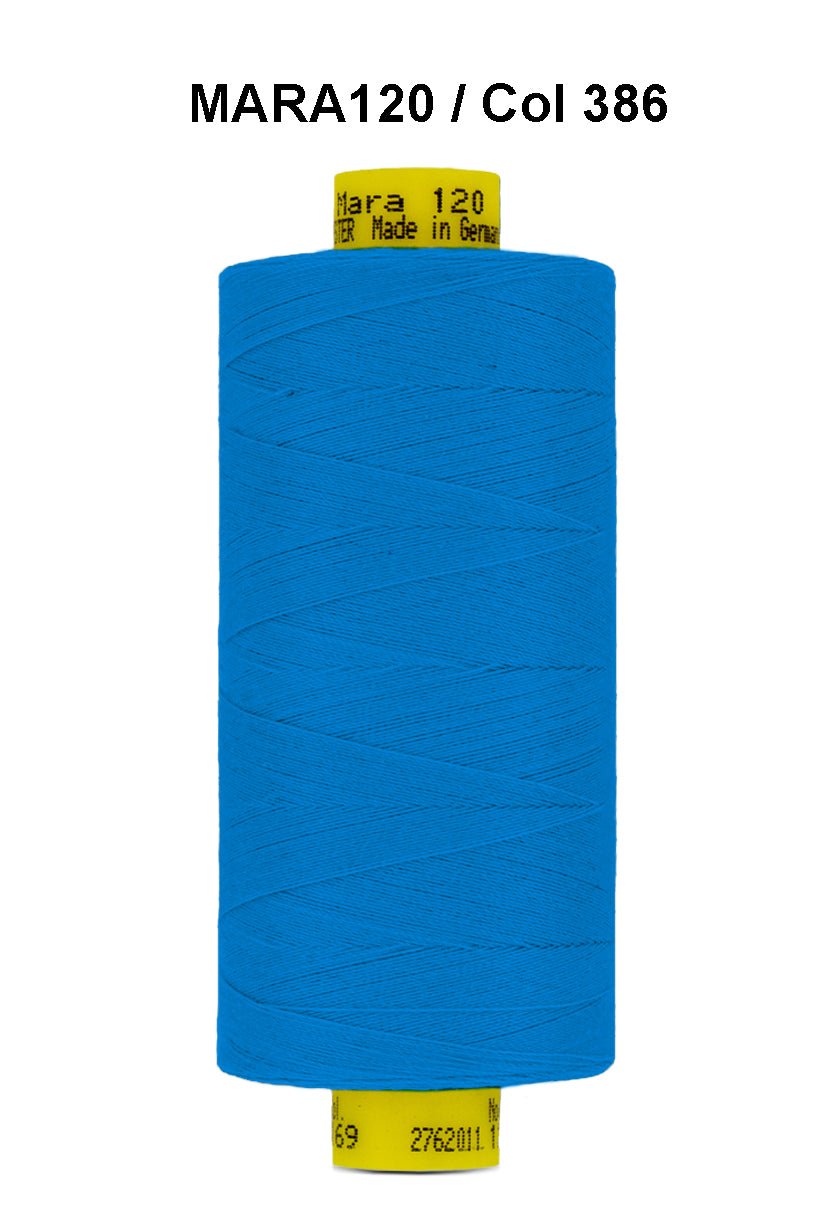 A spool of bright blue Gutermann Mara 120 polyester thread.
