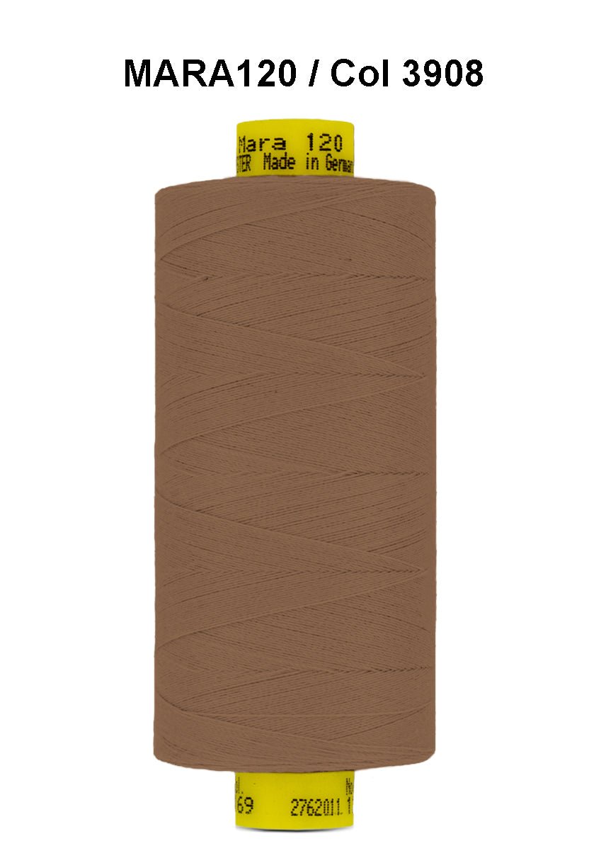 A spool of brown Gutermann Mara 120 thread with product information printed on the label.