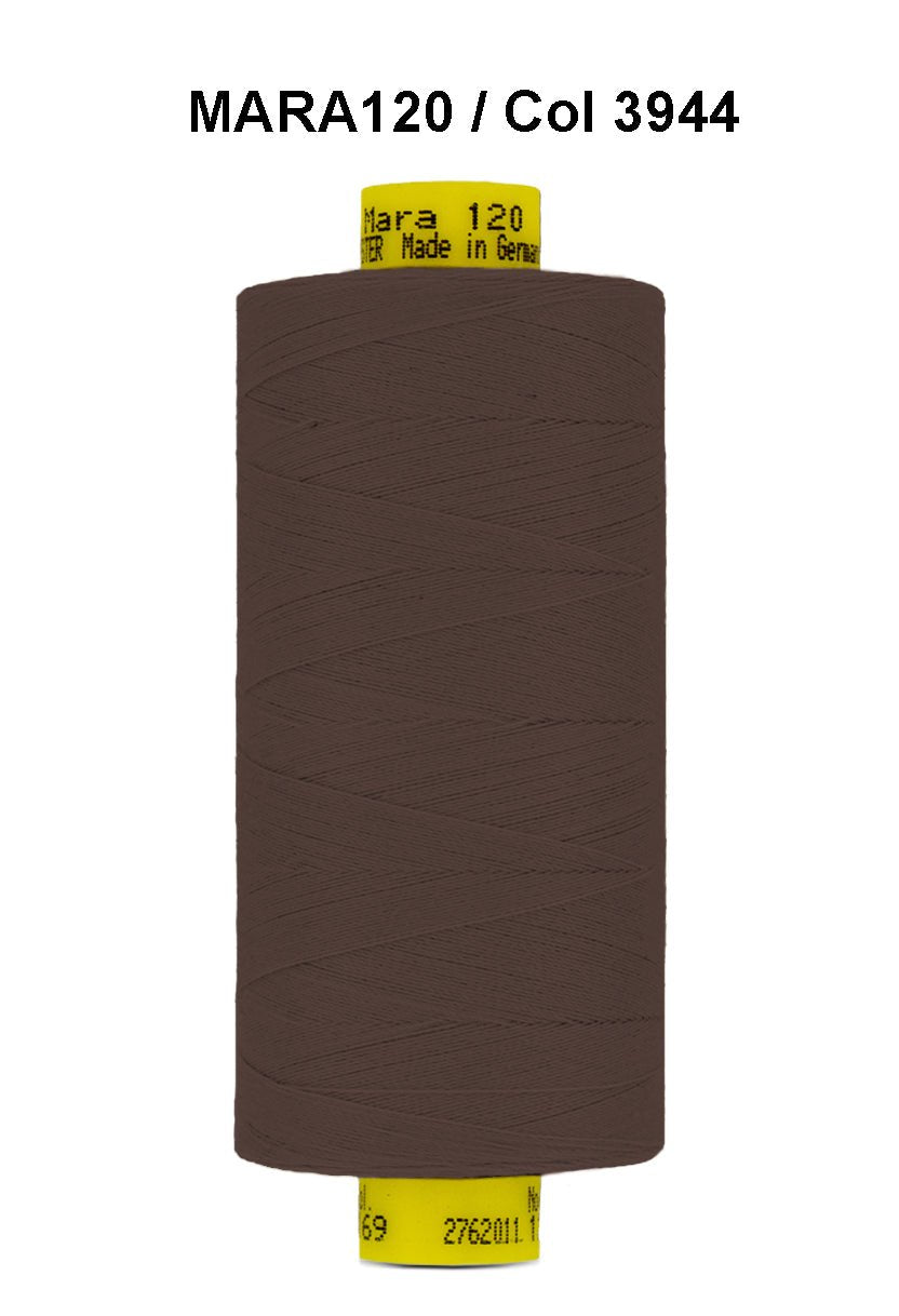 Brown Gutermann Mara 120 polyester thread on a spool.