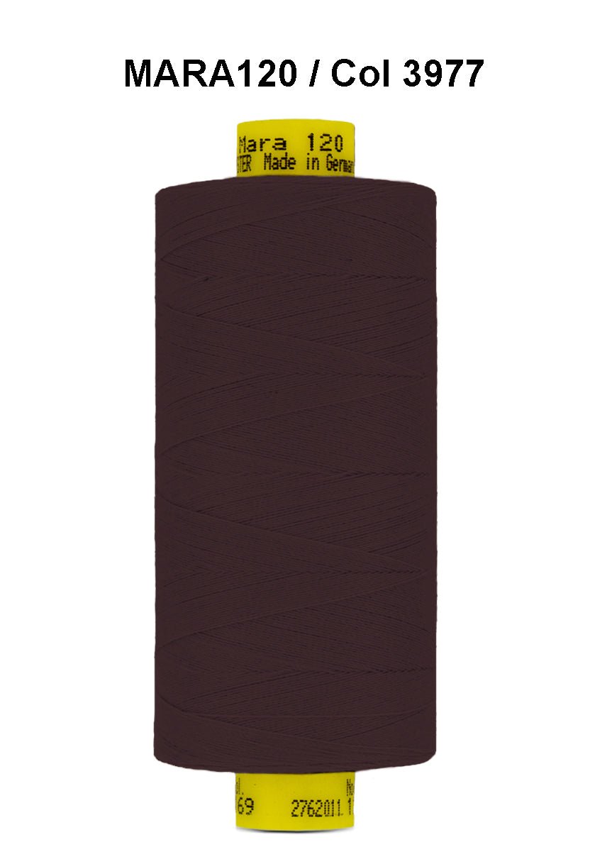 Gutermann Mara 120 polyester thread in dark brown on a spool.
