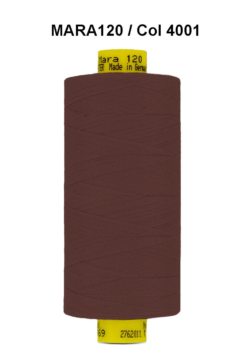 Brown Gutermann Mara 120 polyester thread on a spool.