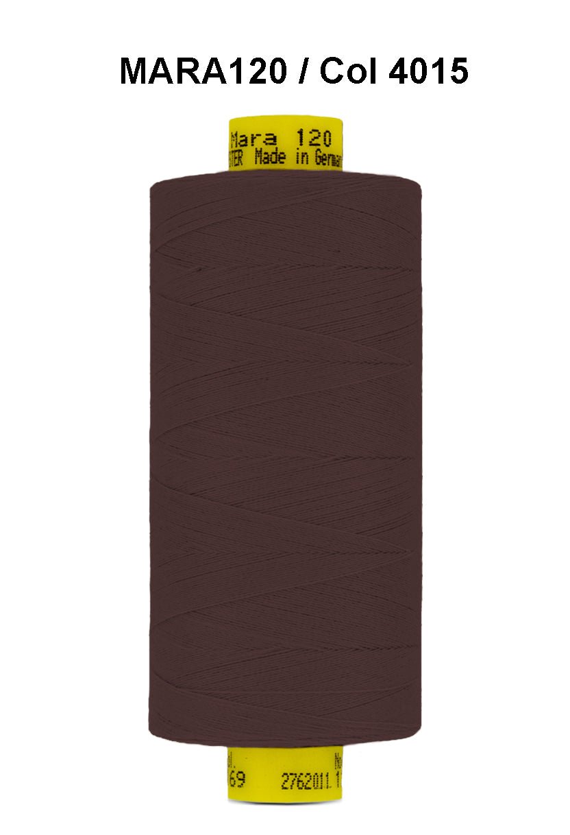 Brown Gutermann Mara 120 polyester thread on a spool.