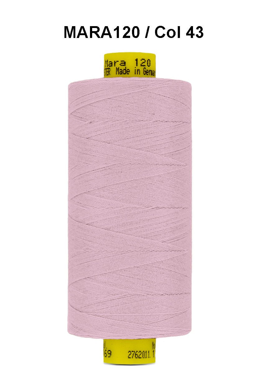 A spool of light pink Gutermann Mara 120 thread.