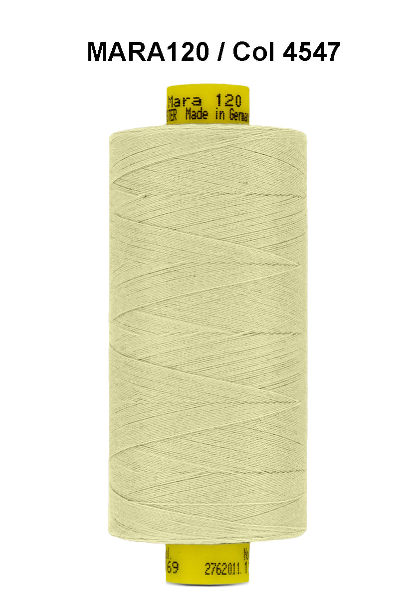 A spool of light yellow Gutermann Mara 120 thread.