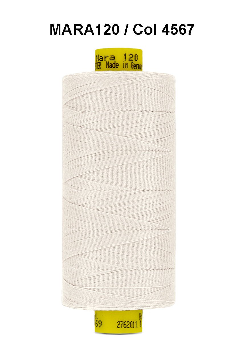 A spool of light beige Gutermann Mara 120 thread.