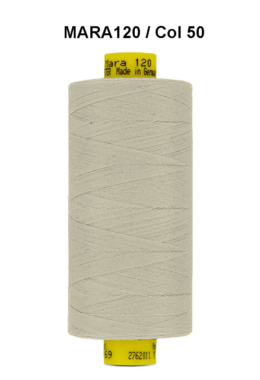 A spool of light beige Gutermann Mara 120 thread.