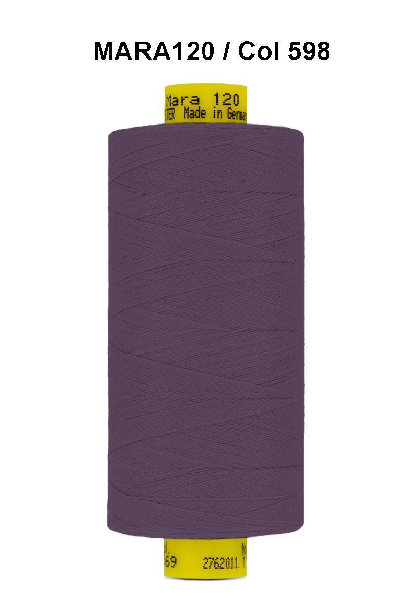 A spool of purple Gutermann Mara 120 thread with yellow labeling.