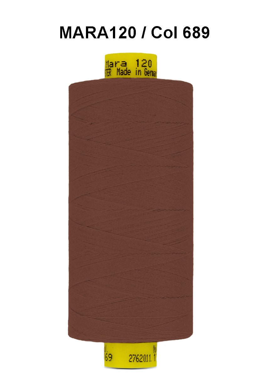 Brown Gutermann Mara 120 polyester thread on a spool.