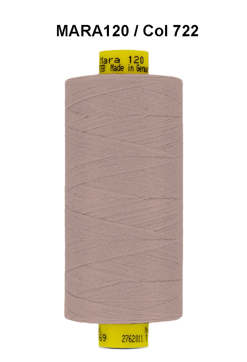 Gutermann Mara 120 thread in a light brown color on a spool.