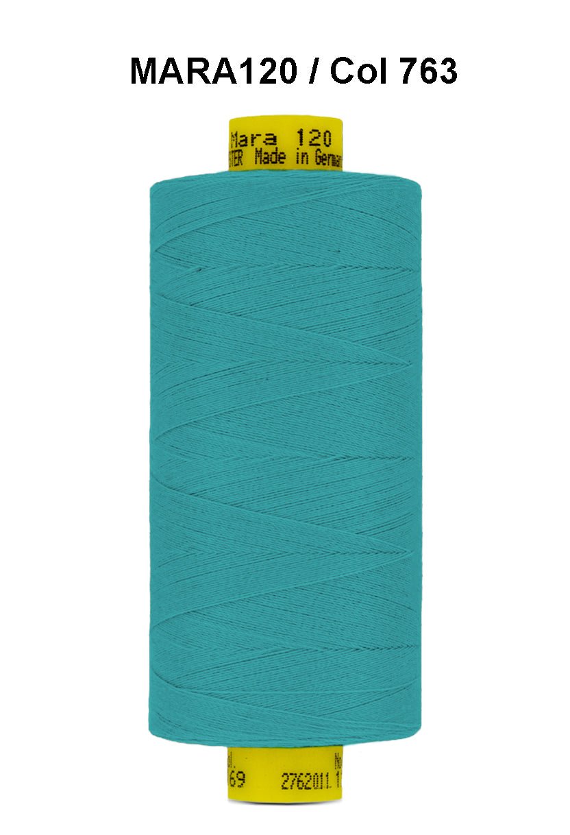 Teal Gutermann Mara 120 polyester sewing thread on a spool.
