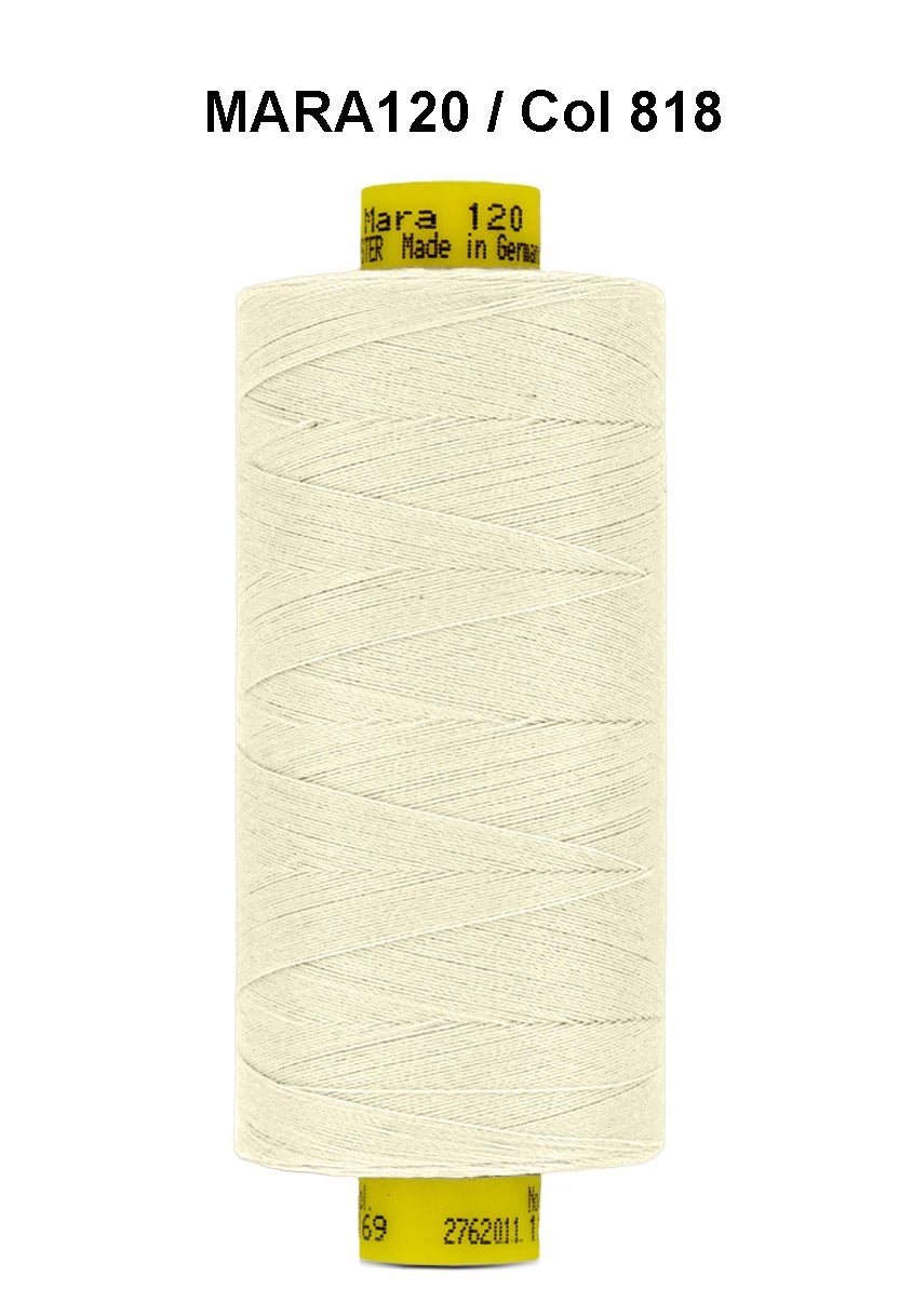 A spool of light cream Gutermann Mara 120 thread.