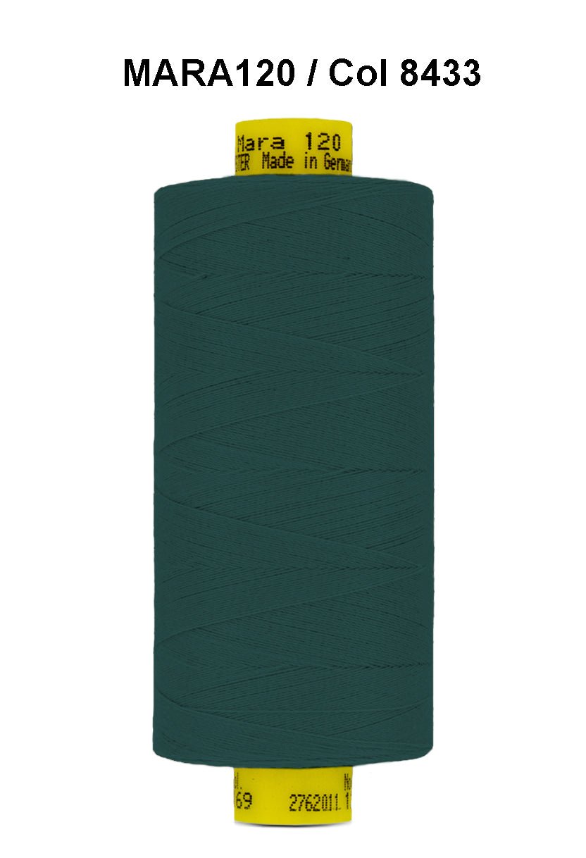 A spool of dark teal Gutermann Mara 120 thread.