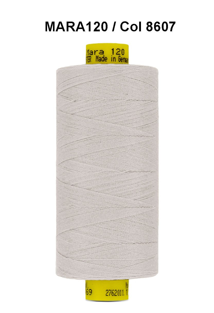 A spool of light grey Gutermann Mara 120 thread.