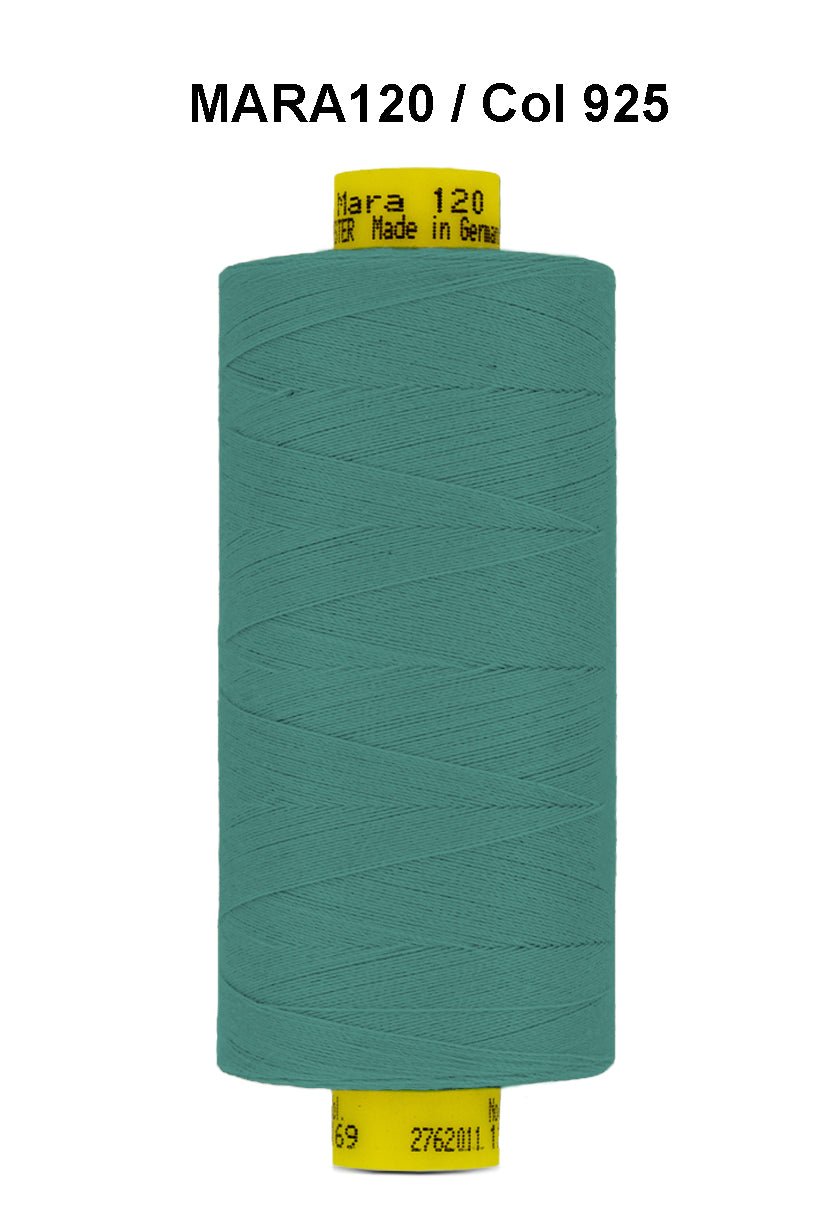 A spool of teal Gutermann Mara 120 thread with yellow labeling.