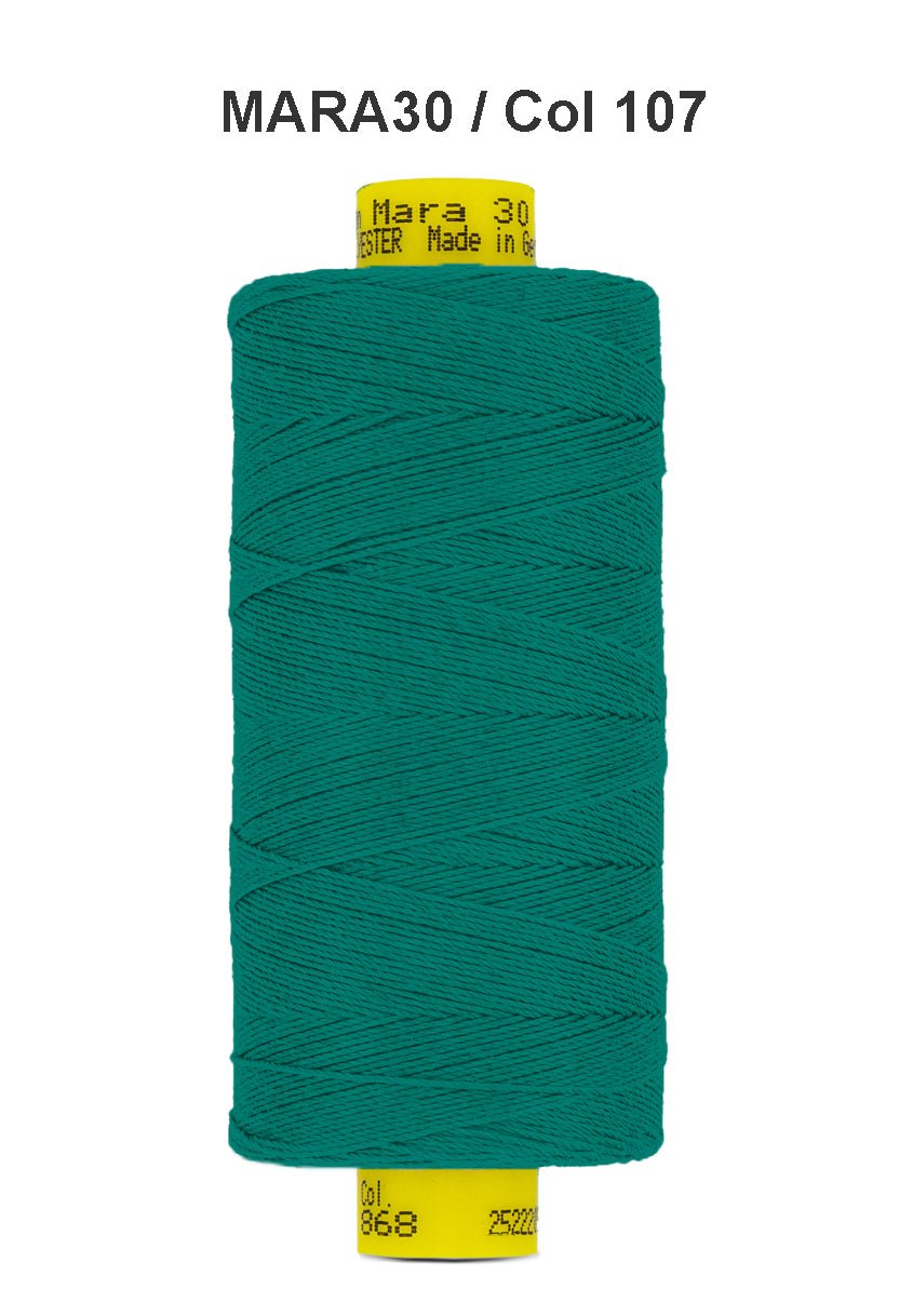 A spool of teal Mara 30 polyester thread with product information printed on the label.