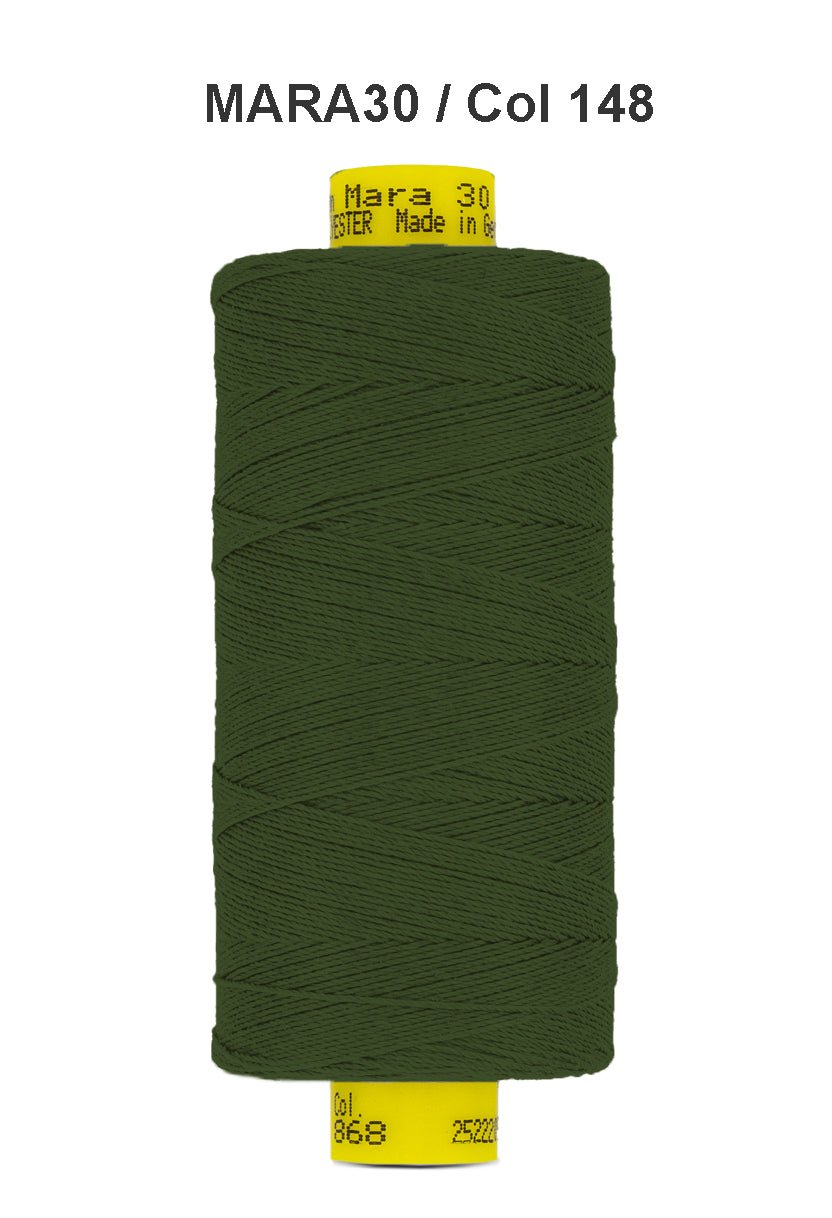A spool of dark green Gutermann Mara 30 polyester thread.