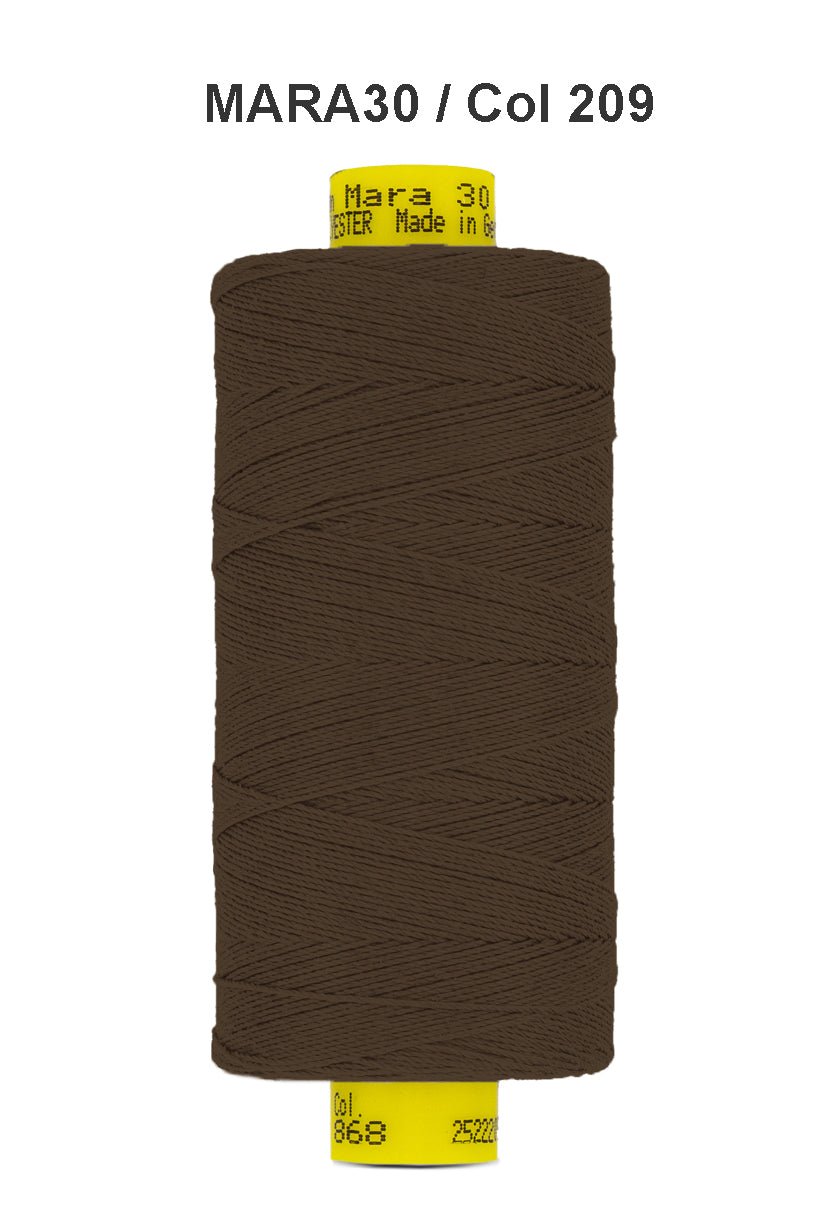 Brown Gutermann Mara 30 polyester thread on a spool.