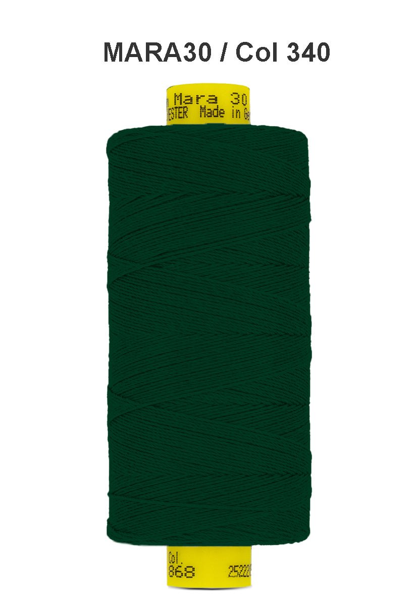 A spool of dark green Gutermann Mara 30 polyester thread.