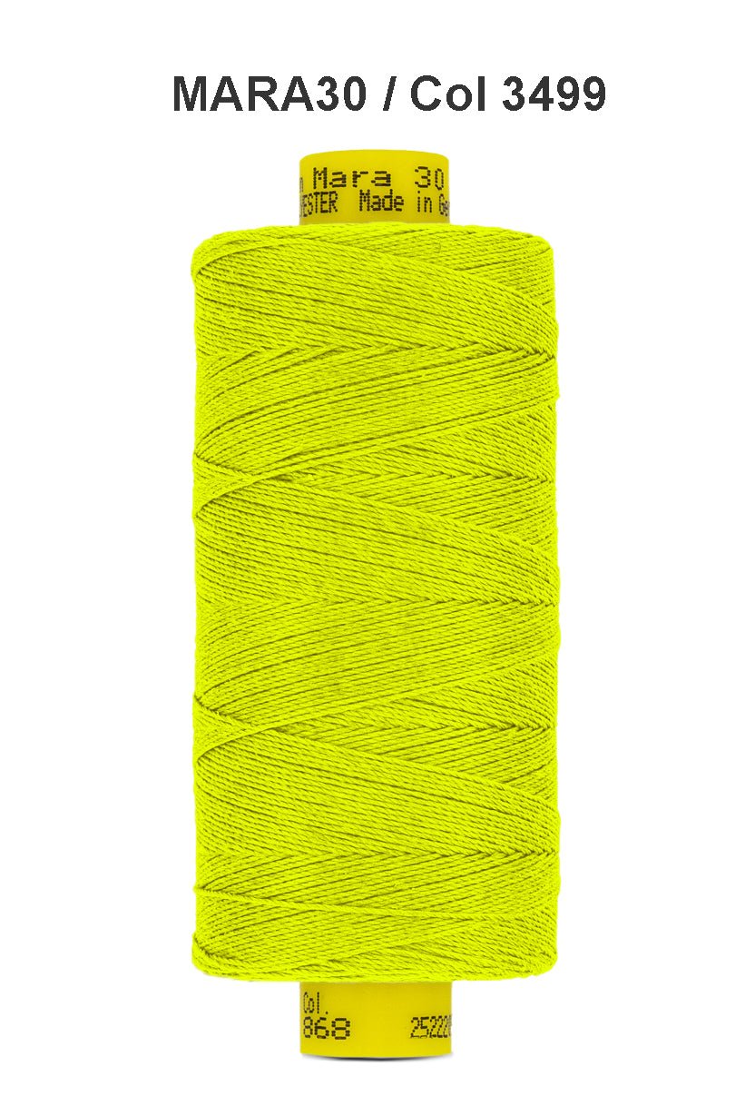 A spool of bright yellow Gutermann Mara 30 polyester thread.