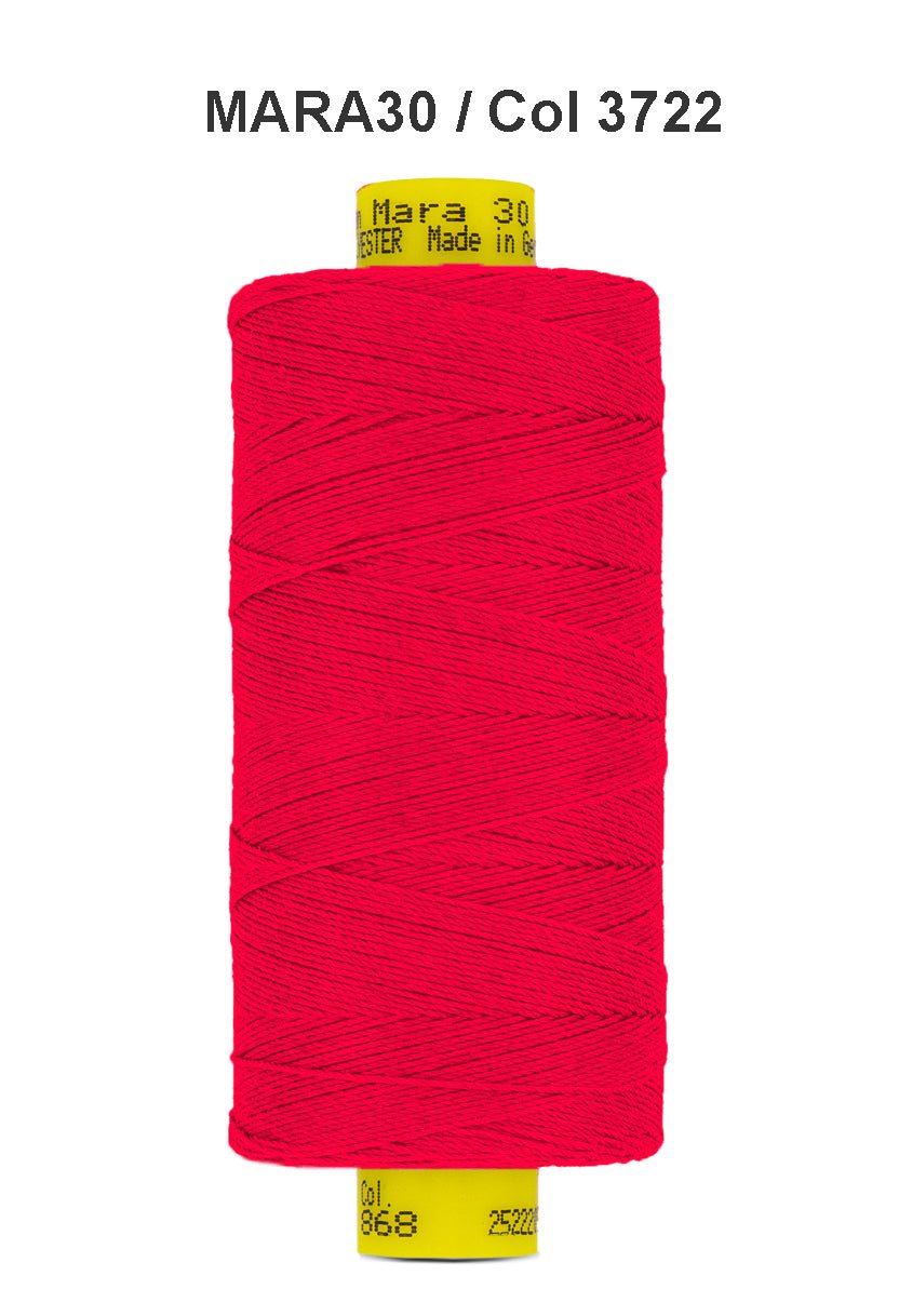 Red Gutermann Mara 30 polyester sewing thread on a spool.