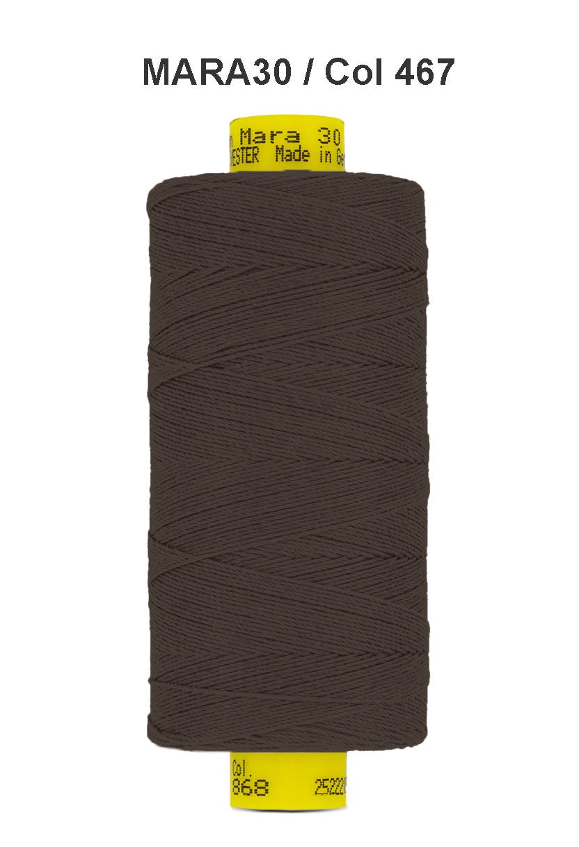Brown Gutermann Mara 30 polyester thread on a spool.