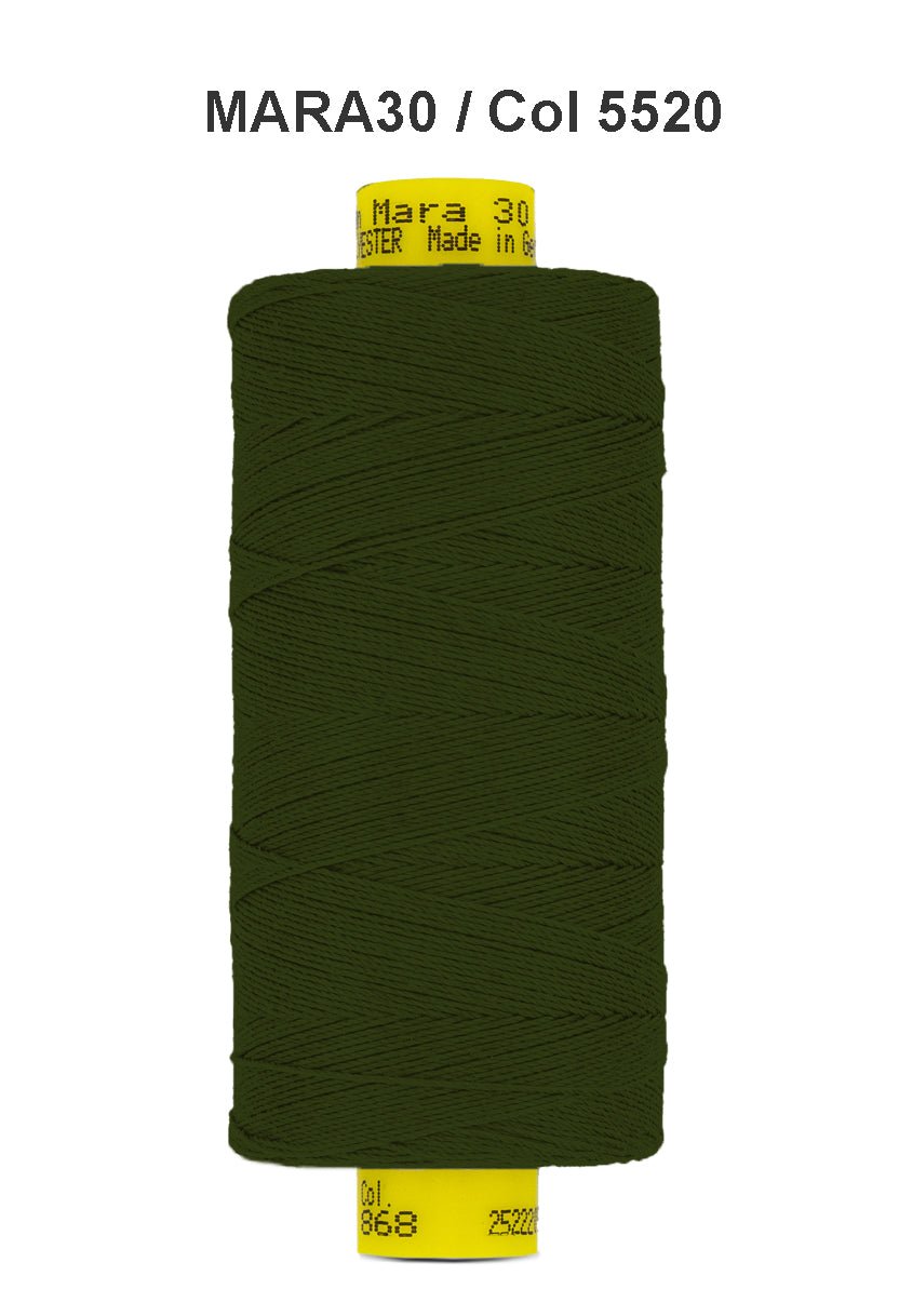 A spool of dark green Gutermann Mara 30 polyester thread.