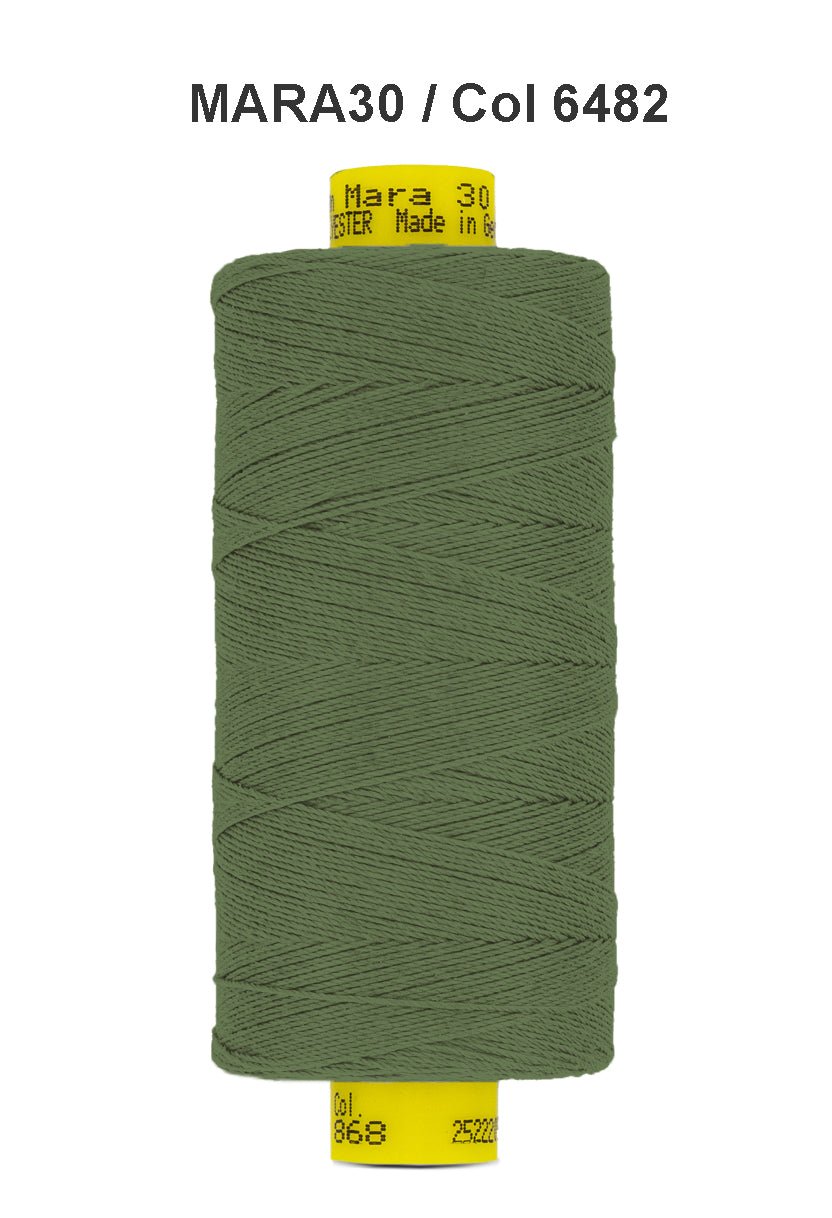 A spool of olive green Gutermann Mara 30 polyester thread.