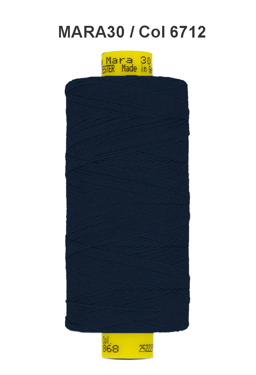 Dark navy blue Gutermann Mara 30 polyester thread on a spool.