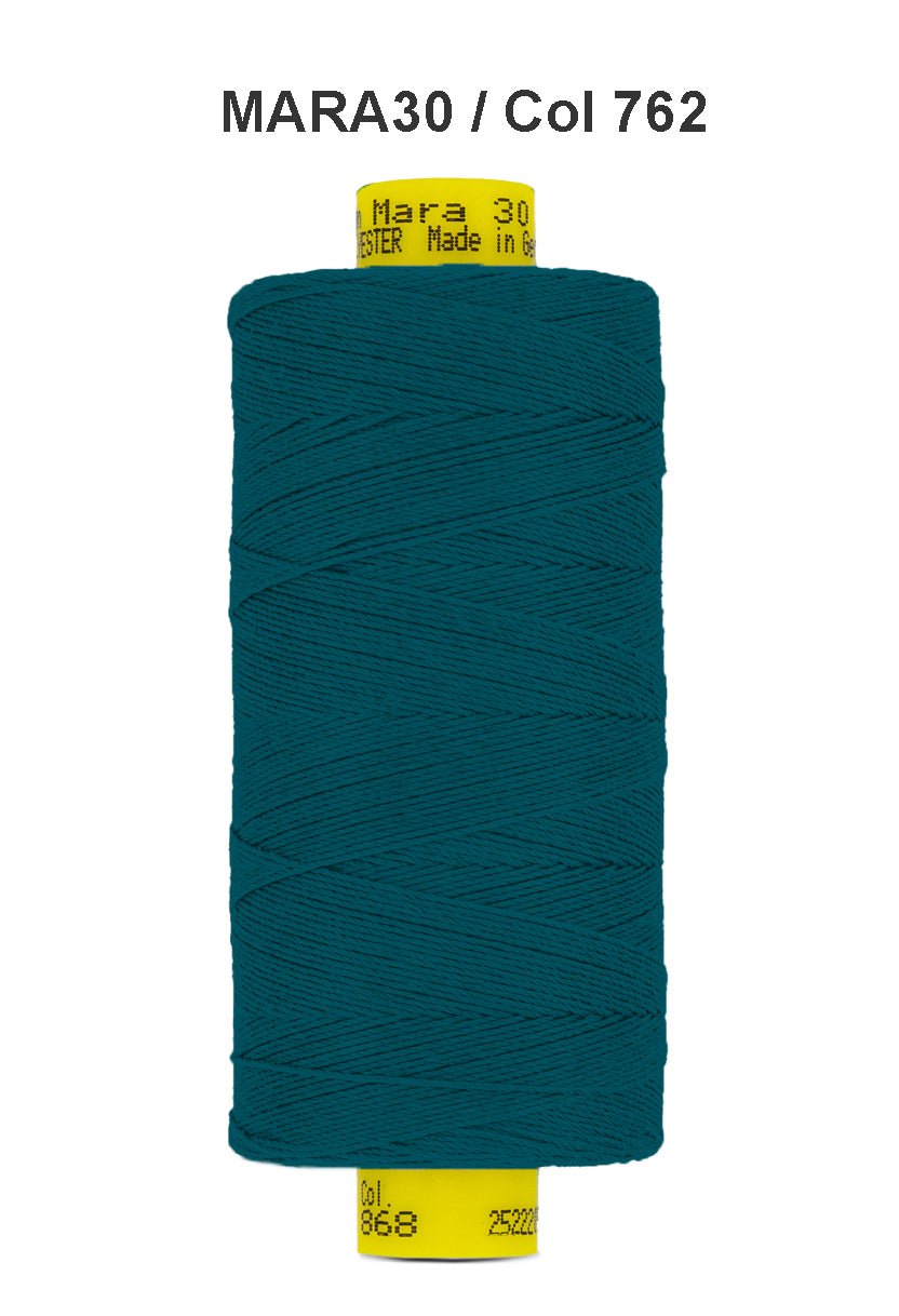 Teal Mara 30 polyester thread on a spool with labels.