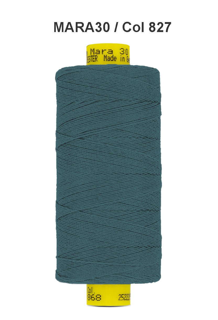 Gutermann Mara 30 polyester thread in teal on a spool.