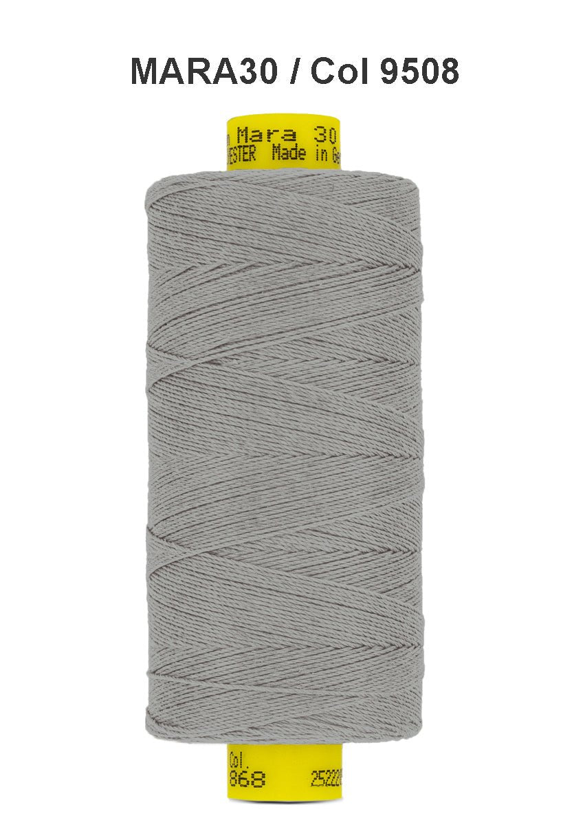 A spool of grey Gutermann Mara 30 polyester thread.