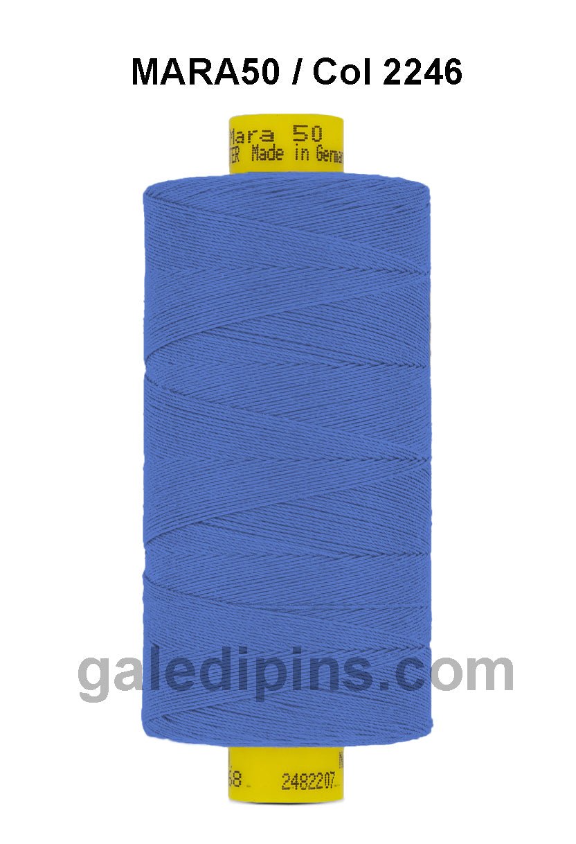 Gutermann Mara 50 thread, blue spool with yellow label.