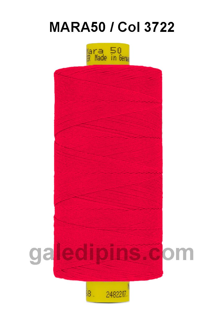 Gutermann Mara 50 red polyester sewing thread on a spool.
