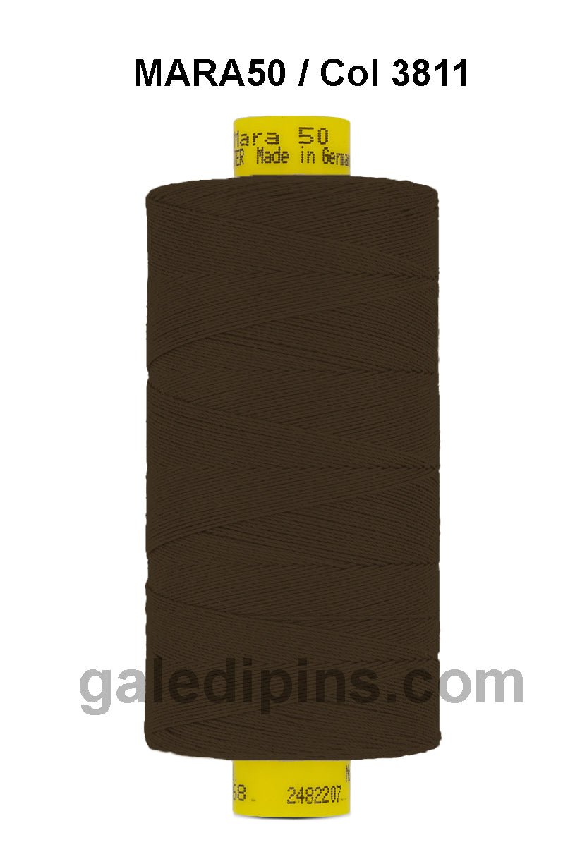 Brown Gutermann Mara 50 polyester thread on a spool.